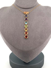 Load image into Gallery viewer, Elegant and timeless BLiSS by Adeline custom designed 7 Chakra necklace. The 4mm stones are: Violet: Iolite Purple: Amethyst Blue: Aqua Marine Green: Peridot Yellow: Citrine Orange: Orange Sapphire Red: Garnet