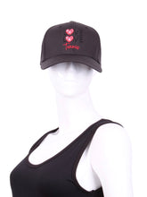 Load image into Gallery viewer, The Black Hat LLT Logo Holey Back with the "Love Love Tennis" Logo and holey back is a stylish and functional accessory designed for tennis enthusiasts who want to combine fashion with functionality on the court. The hat is primarily black, which gives it a sleek and versatile appearance, making it suitable for various tennis outfits. At the front of the hat, prominently displayed, is the "Love Love Tennis" logo.