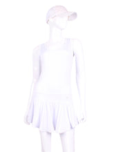 Load image into Gallery viewer, The Sandra Mee Dress offers a playful, fun, and very flirty look. Our dress is fitted, and flares out at the skirt with cute cut out ''O'' in the back. It is perfect for tennis, running and golf (with our Leg Lengthening Leggings), and of course, a trip to your after-court party with your friends. It was designed for confident women like you!