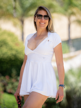 Load image into Gallery viewer, The Adeline Dress offers a playful, fun, and very flirty look. Offers a sweetheart neckline, empire waist and flowing A-line skirt. It is perfect for tennis, running and golf (with our Leg Lengthening Leggings), and of course, a trip to your after-court party with your friends. It was designed for confident women like you!