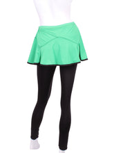 Load image into Gallery viewer, This is our limited edition Triangle Green Skirt with Black Leggings. This piece has a silky soft and quick-drying and binding to match. We make these in very small quantities - by design. Unique. Luxurious. Comfortable. Cool. Fun.