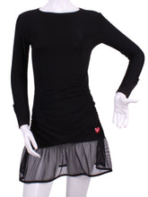 Load image into Gallery viewer, Long Sleeve Monroe Black Mesh Tennis Dress. The Monroe Dress offers a little more coverage around the chest and the arms, but delicately shows your feminine curves. Our dress is fitted, and flares out at the skirt. It is perfect for tennis, running and golf, and of course, a trip to your after-court party with your friends. It was designed for confident women like you! This style is in black with mesh, with a flattering bateau neckline.