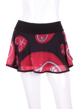 Load image into Gallery viewer, My all new Mondrian Mesh O Skirt  - feminine, soft and very cool!  Each skirt has soft shorties connected.  The mesh makes it very light and airy and carries my TM logo of the heart and rackets!  It is a little see through - allowing for the black shorties underneath to be seen a little.