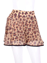 Load image into Gallery viewer, This limited Leopard Mesh LOVE "O" Skirt has shorties underneath and NO seams on the "O"!  It's cut like a doughnut to show and move beautifully as you play.  The fabric is uber soft and light - it dries quickly - and protects from UV rays too.  This skirt has a “nearly naked” feel about it.   Sleek black thread and binding.