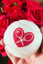Load image into Gallery viewer, The cutest tennis balls ever. The pressured white balls are handmade in Bath, England (where Adeline the designer was actually born) - and bear the LOVE LOVE TENNIS trademark Heart + Rackets Logo.