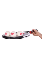 Load image into Gallery viewer, The cutest tennis balls ever. The pressured white balls are handmade in Bath, England (where Adeline the designer was actually born) - and bear the LOVE LOVE TENNIS trademark Heart + Rackets Logo.