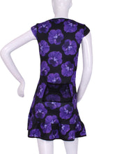 Load image into Gallery viewer, The Monroe Dress has capped sleeves, and moon-shaped ruching in the waistline to accentuate your curves. This print is very limited, the Purple Pansy, with a flattering scoop neckline. Glide around in your Court To Cocktail Tennis dress. Handmade in Los Angeles.