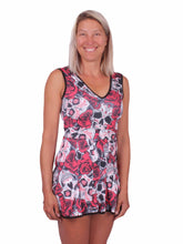 Load image into Gallery viewer, The Angelina Dress is modern yet classy. This style is in our very limited Skull + Roses print, with a flattering vee style neck neckline. This soft, silky, and sexy tennis dress has an empire waist and a feminine skirt. With the exclusive dry ball back pocket - you don't need to tuck your tennis balls into your shorts anymore. Designed by our Founder Adeline in Beverly Hills. Sewn by our team in Downtown Los Angeles.