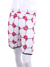 Load image into Gallery viewer, This is our limited edition Men’s Shorts with Raspberry Red Hearts and Net. This piece has a silky and soft fabric. Back pockets to hold tennis balls. We make these in very small quantities - by design. Unique. Luxurious. Comfortable. Cool. Fun.