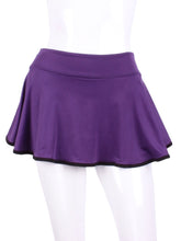 Load image into Gallery viewer, This limited Purple LOVE "O" Skirt has shorties underneath and NO seams on the "O"!  It's cut like a doughnut to show and move beautifully as you play.  The fabric is uber soft and light - it dries quickly - and protects from UV rays too.  This skirt has a “nearly naked” feel about it.  The embroidery Heart is Black + Rackets and Ball Purple to match the skirt.  Sleek black thread and binding.