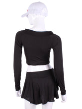 Load image into Gallery viewer, Black Vee Crop Top. This vee neckline tops arm protection from the sun, but have mesh under the arm to keep you COOL while you play. Designed very short to allow for access to the back pocket on my court to cocktails tennis dresses.