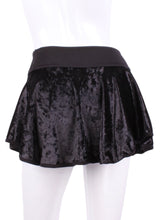 Load image into Gallery viewer, This is our limited edition Crushed Black Velvet LOVE “O” Skirt! Each Skirt is hand cut in ONE PIECE with no side seams! It flows as you twirl on the court. (And we LOVE receiving “slow motion” videos of our clients doing the #tennistwirl on Instagram @ilovemydoublespartner) This piece has a silky soft and quick drying black waistband, shorties and binding to match. We make these in very small quantities - by design. Unique. Luxurious. Comfortable. Cool. Fun.