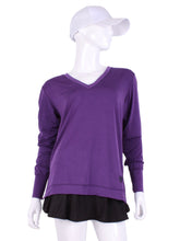 Load image into Gallery viewer, Purple Long Sleeve Very Vee Tee. It’s called the Long Sleeve Very Vee Tee - because as you can see - the Vee is - well you know - VERY VEE! For the tennis lady who loves to leave her chest open - but cover her arms (and other bits) this top is seductive in a sweet way! You feel nearly naked in it. So go ahead - hit that ace! Flattering and free - that’s what this top is. The most preppy of my tops - looks just as good tied around the shoulders as it does on.
