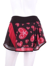Load image into Gallery viewer, My all new Mondrian Mesh O Skirt  - feminine, soft and very cool!  Each skirt has soft shorties connected.  The mesh makes it very light and airy and carries my TM logo of the heart and rackets!  It is a little see through - allowing for the black shorties underneath to be seen a little.