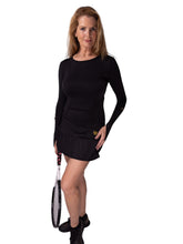 Load image into Gallery viewer, Our &quot;Long Sleeve Monroe Tennis Dress&quot; offers a little more coverage around the chest and arms than our &quot;Monroe Tennis Dress&quot;, yet delicately shows your feminine curves. The dress is fitted throughout the body, with a flirty ruffle at the hem.  It&#39;s perfect for tennis, and yet elegant enough for drinks after your win. 
