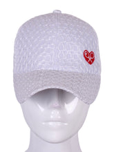Load image into Gallery viewer, This hat is adorable.  It’s bright white and embroidered with our Trade Mark Heart and Rackets design with an adjustable Velcro back.  So very cute!  A very feminine tennis hat.
