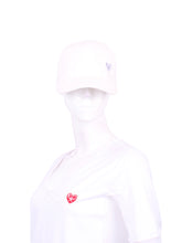 Load image into Gallery viewer, The luxurious White Faux Suede With Silver Heart tennis hat is the epitome of elegance and style on the tennis court. Crafted with the utmost attention to detail, this hat combines comfort, functionality, and a touch of opulence.
