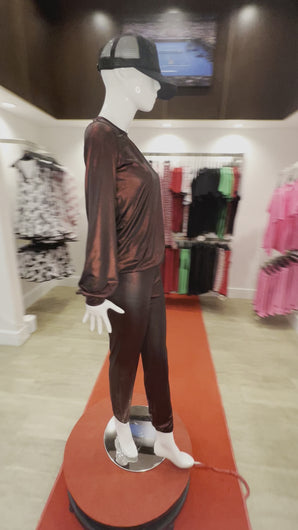 These pants are baggy and have a lose elastic on the waist allowing for comfort and the ability to pull them up or wear them low on the hips.  They are very light and roomy to allow for air flow.