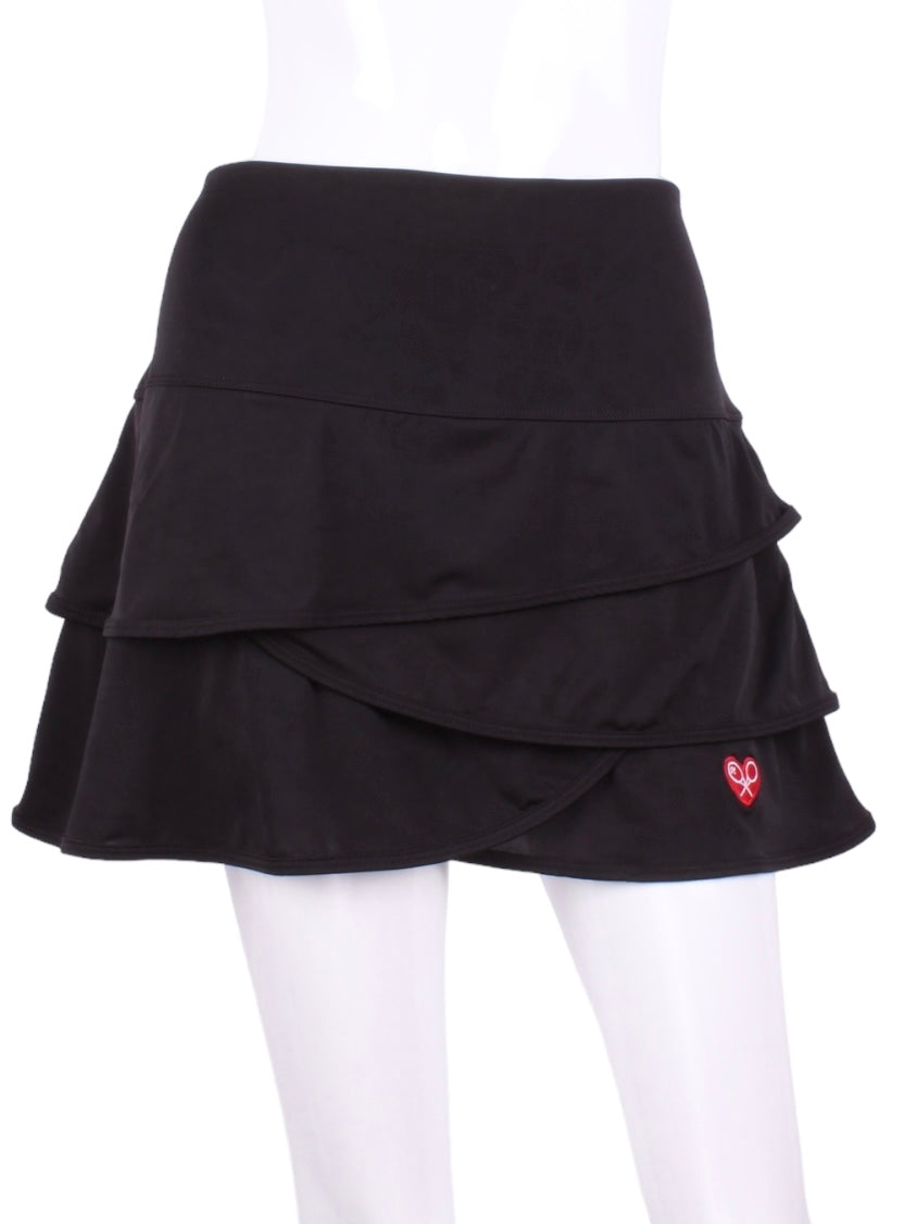 The all new Layer Skirt is high waisted and has layers of fabric going down.  With soft shorts underneath - it's the perfect compliment to your tennis game.