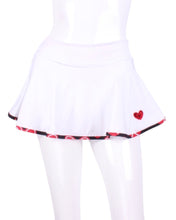 Load image into Gallery viewer, This gorgeous mini heart on off white LOVE &quot;O&quot; Skirt has shorties underneath and NO seams on the &quot;O&quot;!  It&#39;s cut like a doughnut to show and move beautifully as you play.  The fabric is uber soft and light - it dries quickly - and protects from UV rays too.  This skirt has a “nearly naked” feel about it.

