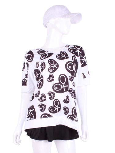 Random Black Heart Baggy Vee Tee The very comfortable Baggy Vee Tee is so cool and easy to wear.  For the lady that likes a little room when she plays - the feminine top is flowing in the air.  This random black heart on a white background has a white stripe down the sides, hem, collar, and cuff.