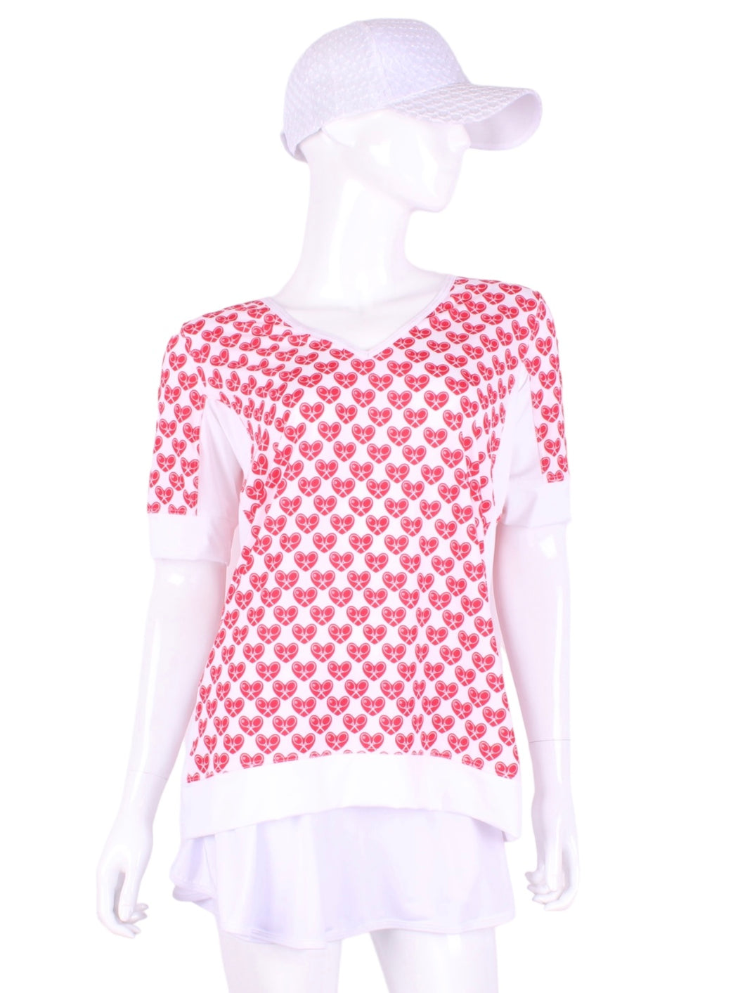  The very comfortable Baggy Vee Tee is so cool and easy to wear.  For the lady that likes a little room when she plays - the feminine top is flowing in the air.  This Mini Hearts on a white background has a white stripe down the sides, hem, collar, and cuff.