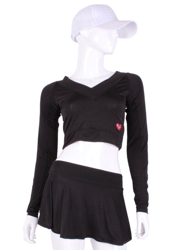 Black Vee Crop Top. This vee neckline tops arm protection from the sun, but have mesh under the arm to keep you COOL while you play.    Designed very short to allow for access to the back pocket on my court to cocktails tennis dresses.