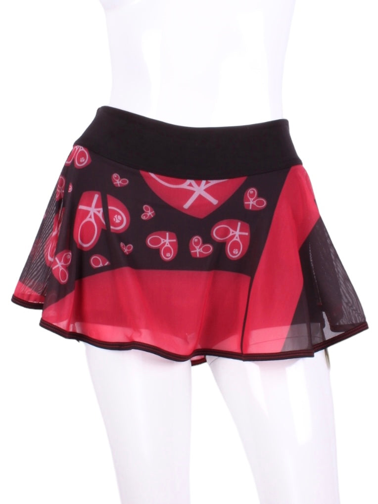 My all new Mondrian Mesh O Skirt  - feminine, soft and very cool!  Each skirt has soft shorties connected.  The mesh makes it very light and airy and carries my TM logo of the heart and rackets!  It is a little see through - allowing for the black shorties underneath to be seen a little.  